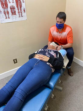 Neck pain, chiropractic adjustment, neck traction